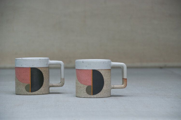 Photo of two Pawena Studio cups.